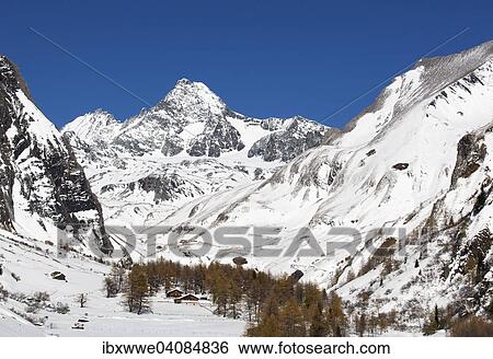 Stock Photograph - Kalser Tal valley, Mt Grossglockner at the back, East Tyrol, Tyrol, Austria, Europe. Fotosearch