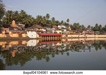 Stock Image - Koti Teertha, sacred lake and swimming area, Gokarna, Karnataka, India, Asia. Fotosearch