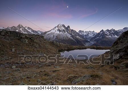 Stock Image - Lac des Chesery with Mont Blanc massif after sunset, Chamonix, Rhone-Alpes, France, Europe. Fotosearch