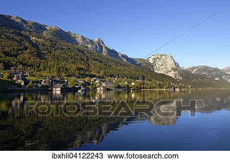 Stock Image - Lake Grundlsee with village of Grundlsee, Ausseerland, Styrian Salzkammergut, Styria, Austria, Europe. Fotosearch