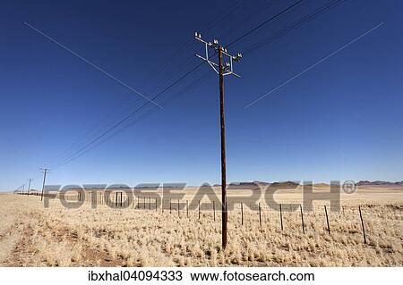 Landscape with electricity and telephone poles along the B4, near Aus, Namibia, Africa View Large Photo Image Stock Image - Landscape with electricity and telephone poles along the B4, near Aus, Namibia, Africa. Fotosearch