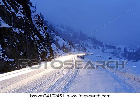 Light trails on a snowy mountain pass, Lukmanier Pass, Canton of Graubunden, Switzerland, Europe View Large Photo Image Stock Image - Light trails on a snowy mountain pass, Lukmanier Pass, Canton of Graubunden, Switzerland, Europe. Fotosearch