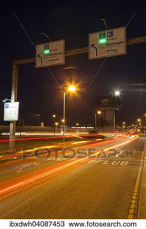 Stock Image - Light trails on the access road to Dortmund Airport 21, Dortmund, Ruhr Area, North Rhine-Westphalia, Germany, Europe. Fotosearch
