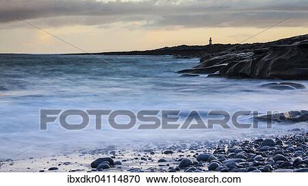 Lighthouse by the coast, high tide, Inis Oirr, Aran Islands, Ireland, Europe View Large Photo Image Stock Image - Lighthouse by the coast, high tide, Inis Oirr, Aran Islands, Ireland, Europe. Fotosearch