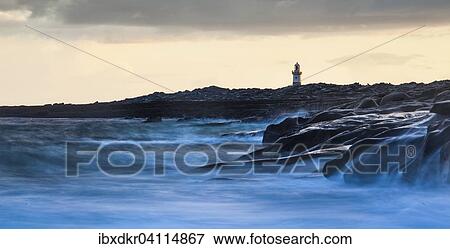 Lighthouse by the coast, high tide, Inis Oirr, Aran Islands, Ireland, Europe View Large Photo Image Stock Photo - Lighthouse by the coast, high tide, Inis Oirr, Aran Islands, Ireland, Europe. Fotosearch