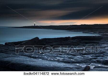 Stock Image - Lighthouse by the coast, Inis Oirr, Aran Islands, Ireland, Europe. Fotosearch