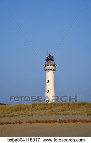 Stock Photo - Lighthouse, dunes, Egmond aan Zee, province of North Holland, The Netherlands, Europe. Fotosearch
