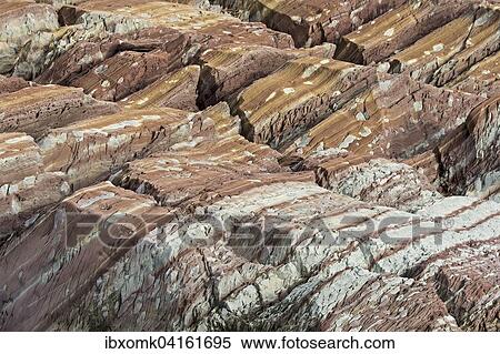 Limestone coloured red by iron and whitish-yellow dolomite, Segelsallskapet Fjord, Northeast Greenland National Park, Greenland, North America View Large Photo Image Stock Photography - Limestone coloured red by iron and whitish-yellow dolomite, Segelsallskapet Fjord, Northeast Greenland National Park, Greenland, North America. Fotosearch