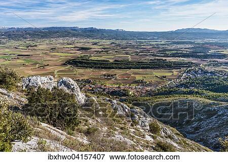 Stock Photo - Limestone massif of Ste-Victoire, favorite place of Paul Cezanne, view from the ridge to the south of the village and the valley of the Arc, Puyloubier, Provence-Alpes-Cote d'Azur, France, Europe. Fotosearch