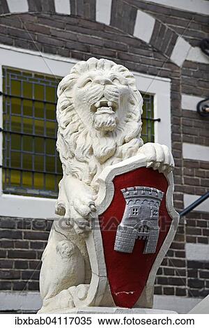 Lion sculpture, coat of arms, Stadthuis, City Hall, Alkmaar, North Holland, The Netherlands, Europe View Large Photo Image Stock Photography - Lion sculpture, coat of arms, Stadthuis, City Hall, Alkmaar, North Holland, The Netherlands, Europe. Fotosearch