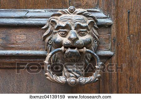 Lionhead as doorknocker of an entrance door, Konigsberg, Bayern, Germany, Europe View Large Photo Image Stock Photo - Lionhead as doorknocker of an entrance door, Konigsberg, Bayern, Germany, Europe. Fotosearch