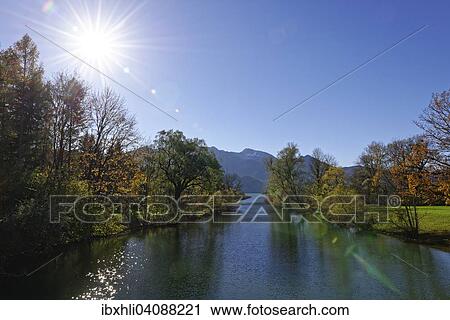Loisach river flows out of Lake Kochel or Kochelsee Lake, Mt Heimgarten at the back, Kochel am See, Upper Bavaria, Bavaria, Germany, Europe View Large Photo Image Stock Image - Loisach river flows out of Lake Kochel or Kochelsee Lake, Mt Heimgarten at the back, Kochel am See, Upper Bavaria, Bavaria, Germany, Europe. Fotosearch