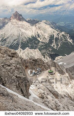 Stock Image - Lorenzihutte refuge, 2932 m, mountain station of the cable car, at the back Mt Croda Rossa, 3146 m, view from the Marino Bianchi Via Ferrata, Cristallo group, Ampezzo Dolomites, Cortina d'Ampezzo, Province of Belluno, Veneto, Italy, Europe. Fotosearch