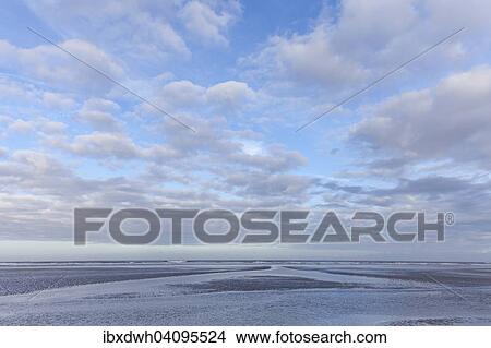 Low tide in the Lower Saxon Wadden Sea National Park, Langeoog Island, East Frisia, North Sea Coast, Lower Saxony, Germany, Europe View Large Photo Image Picture - Low tide in the Lower Saxon Wadden Sea National Park, Langeoog Island, East Frisia, North Sea Coast, Lower Saxony, Germany, Europe. Fotosearch