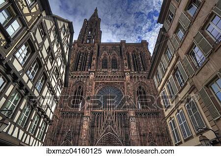 Main facade with tower of the Strasbourg Cathedral, old town houses on both sides, Strasbourg, Alsace, France, Europe View Large Photo Image Stock Photography - Main facade with tower of the Strasbourg Cathedral, old town houses on both sides, Strasbourg, Alsace, France, Europe. Fotosearch