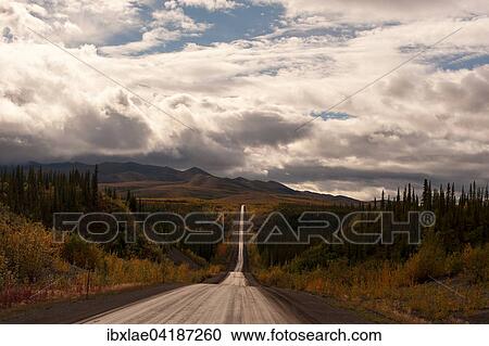 Stock Image - Main road towards north, Dempster Highway, McPherson, Yukon Territory, Canada, North America. Fotosearch