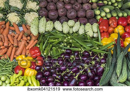 Market stall with okra, cauliflower, beets, carrots, eggplant, cucumbers, Mattancherry, Kochi, Cochin, Kerala, India, Asia View Large Photo Image Stock Photo - Market stall with okra, cauliflower, beets, carrots, eggplant, cucumbers, Mattancherry, Kochi, Cochin, Kerala, India, Asia. Fotosearch