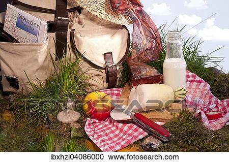 Stock Image - Meal break whilst hiking. Fotosearch