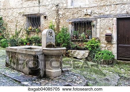 Medieval fountain, Saint-Paul or Saint-Paul-de-Vence, Alpes-Maritimes, Provence-Alpes-Cote d'Azur, France, Europe View Large Photo Image Stock Photography - Medieval fountain, Saint-Paul or Saint-Paul-de-Vence, Alpes-Maritimes, Provence-Alpes-Cote d'Azur, France, Europe. Fotosearch