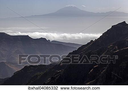Mirador de Degollada Paraza view to the east of La Gomera and Mount Teide on Tenerife, La Gomera, Canary Islands, Spain, Europe View Large Photo Image Stock Image - Mirador de Degollada Paraza view to the east of La Gomera and Mount Teide on Tenerife, La Gomera, Canary Islands, Spain, Europe. Fotosearch