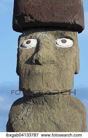 Moai wearing a Pukao topknot, Tahai ceremonial complex, Hanga Roa, Rapa Nui National Park, Unesco World Heritage Site, Easter Island, Chile, South America View Large Photo Image Stock Photo - Moai wearing a Pukao topknot, Tahai ceremonial complex, Hanga Roa, Rapa Nui National Park, Unesco World Heritage Site, Easter Island, Chile, South America. Fotosearch