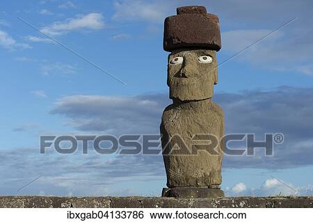 Moai wearing a Pukao topknot, Tahai ceremonial complex, Hanga Roa, Rapa Nui National Park, Unesco World Heritage Site, Easter Island, Chile, South America View Large Photo Image Stock Photograph - Moai wearing a Pukao topknot, Tahai ceremonial complex, Hanga Roa, Rapa Nui National Park, Unesco World Heritage Site, Easter Island, Chile, South America. Fotosearch