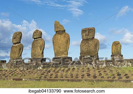 Stock Image - Moais at the Tahai ceremonial complex, Hanga Roa, Rapa Nui National Park, Unesco World Heritage Site, Easter Island, Chile, South America. Fotosearch