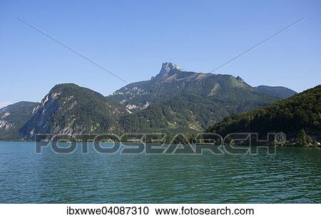 Mondsee lake with views to the Schafberg mountain, Mondsee, Scharfling, Salzkammergut, Upper Austria, Austria, Europe View Large Photo Image Stock Image - Mondsee lake with views to the Schafberg mountain, Mondsee, Scharfling, Salzkammergut, Upper Austria, Austria, Europe. Fotosearch