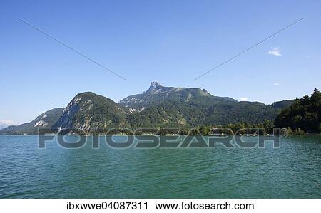Mondsee lake with views to the Schafberg mountain, Mondsee, Scharfling, Salzkammergut, Upper Austria, Austria, Europe View Large Photo Image Stock Image - Mondsee lake with views to the Schafberg mountain, Mondsee, Scharfling, Salzkammergut, Upper Austria, Austria, Europe. Fotosearch