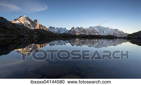 Mont Blanc massif with reflection in the Lac des Chesery, evening, Chamonix, Rhone-Alpes, France, Europe View Large Photo Image Stock Image - Mont Blanc massif with reflection in the Lac des Chesery, evening, Chamonix, Rhone-Alpes, France, Europe. Fotosearch