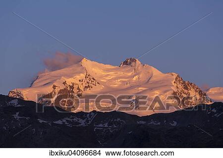 Picture - Monte Rosa Massif, Nordend and Dufourspitze peak, from Berghaus Trift, Zermatt, Canton of Valais, Switzerland, Europe. Fotosearch