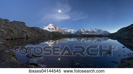 Moon and Mont Blanc reflected in the Lac des Chesery after sunset, Chamonix, Rhone-Alpes, France, Europe View Large Photo Image Stock Photography - Moon and Mont Blanc reflected in the Lac des Chesery after sunset, Chamonix, Rhone-Alpes, France, Europe. Fotosearch
