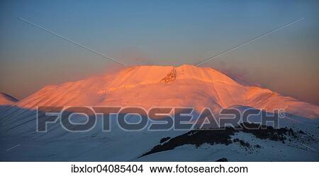 Picture - Mount Vettore at sunset in winter, Sibillini Mountains National Park, Umbria, Italy, Europe. Fotosearch