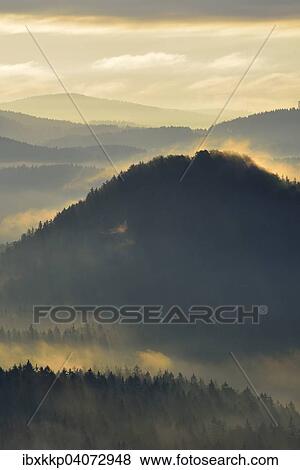 Mountain landscape in morning mist, Elbe Sandstone Mountains, Saxon Switzerland, Saxony, Germany, Europe View Large Photo Image Stock Photo - Mountain landscape in morning mist, Elbe Sandstone Mountains, Saxon Switzerland, Saxony, Germany, Europe. Fotosearch