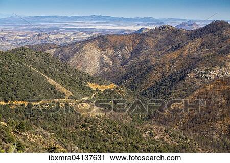 Mountain landscape in Sierra County, desert plain behind, near Silver City, New Mexico, USA View Large Photo Image Stock Image - Mountain landscape in Sierra County, desert plain behind, near Silver City, New Mexico, USA. Fotosearch