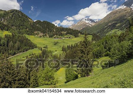 Mountain landscape with farmhouses, near Pragraten am Grossvenediger, Virgental valley, East Tyrol, Austria, Europe View Large Photo Image Picture - Mountain landscape with farmhouses, near Pragraten am Grossvenediger, Virgental valley, East Tyrol, Austria, Europe. Fotosearch