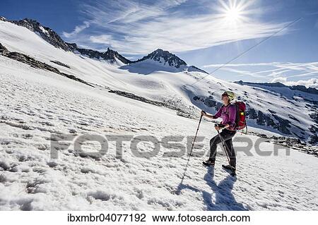 Stock Image - Mountaineer during the ascent of Mt Grosser Moseler, on Mt Nevesferner, at the back Mt Turnerkamp, â€‹â€‹Lappach, Muhlwald Valley, Tauferer Valley, Puster Valley, South Tyrol, Italy, Europe. Fotosearch