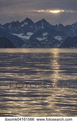 Mountains in the evening light, near Ittoqqortoormiit, Eastern Greenland, Greenland, North America View Large Photo Image Stock Photograph - Mountains in the evening light, near Ittoqqortoormiit, Eastern Greenland, Greenland, North America. Fotosearch