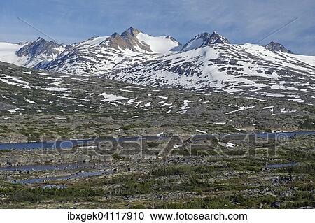 Mountains on the White Pass and Yukon Route between Skagway, Alaska, USA, and Bennett, British Columbia, Canada, North America View Large Photo Image Stock Image - Mountains on the White Pass and Yukon Route between Skagway, Alaska, USA, and Bennett, British Columbia, Canada, North America. Fotosearch