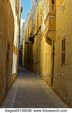 Narrow alley, Mdina, also Citta Vecchia or Citta Notabile, Malta, Europe View Large Photo Image Stock Photo - Narrow alley, Mdina, also Citta Vecchia or Citta Notabile, Malta, Europe. Fotosearch