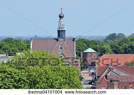 New Church, mill behind, Emden, East Frisia, Lower Saxony, Germany, Europe View Large Photo Image Picture - New Church, mill behind, Emden, East Frisia, Lower Saxony, Germany, Europe. Fotosearch