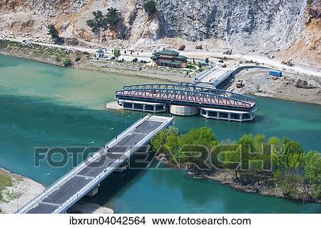 Newly constructed swing bridge over Buna River, Shkoder, Shkodra, Albania, Europe View Large Photo Image Picture - Newly constructed swing bridge over Buna River, Shkoder, Shkodra, Albania, Europe. Fotosearch