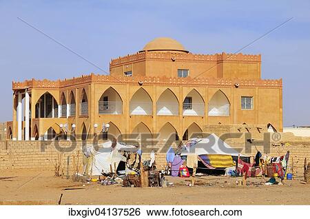 Nomad tent in front of a villa, Atar, Adrar Province, Mauritania, Africa View Large Photo Image Stock Photograph - Nomad tent in front of a villa, Atar, Adrar Province, Mauritania, Africa. Fotosearch