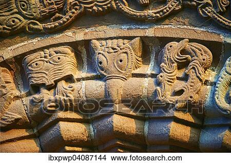 Norman Romanesque relief sculptures of dragons and mythical creatures, circa 1140, South doorway of Church of St Mary and St David, Kilpeck, Herefordshire, England, United Kingdom, Europe View Large Photo Image Picture - Norman Romanesque relief sculptures of dragons and mythical creatures, circa 1140, South doorway of Church of St Mary and St David, Kilpeck, Herefordshire, England, United Kingdom, Europe. Fotosearch