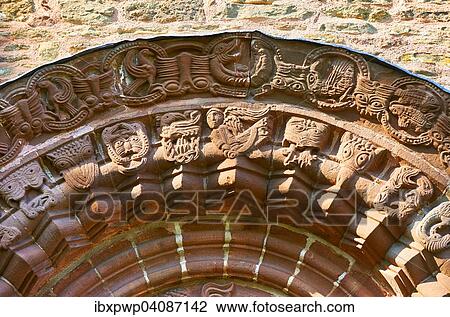 Norman Romanesque relief sculptures of dragons and mythical creatures, circa 1140, South doorway of Church of St Mary and St David, Kilpeck, Herefordshire, England, United Kingdom, Europe View Large Photo Image Stock Image - Norman Romanesque relief sculptures of dragons and mythical creatures, circa 1140, South doorway of Church of St Mary and St David, Kilpeck, Herefordshire, England, United Kingdom, Europe. Fotosearch