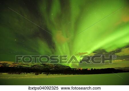 Stock Photography - Northern lights, Aurora borealis, over the frozen river Gammelbollo, Sorrisniva, Alta, Norway, Europe. Fotosearch