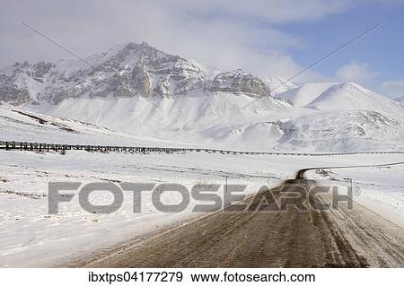 Oil pipeline from Prudhoe Bay to Valdez in the Arctic winter along the Dalton Highway, Haul Road, Alaska, USA View Large Photo Image Stock Photo - Oil pipeline from Prudhoe Bay to Valdez in the Arctic winter along the Dalton Highway, Haul Road, Alaska, USA. Fotosearch