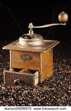 Old coffee grinder, made of wood, circa 1950, on coffee beans View Large Photo Image Stock Photography - Old coffee grinder, made of wood, circa 1950, on coffee beans. Fotosearch