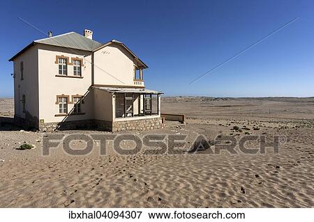 Old house in the former diamond town, now a ghost town, Kolmanskop, Kolmannskuppe, near Luderitz, Namibia, Africa View Large Photo Image Stock Photo - Old house in the former diamond town, now a ghost town, Kolmanskop, Kolmannskuppe, near Luderitz, Namibia, Africa. Fotosearch