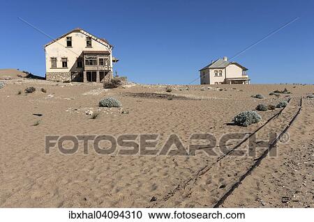 Old houses in the former diamond town, now a ghost town, Kolmanskop, Kolmannskuppe, near Luderitz, Namibia, Africa View Large Photo Image Stock Image - Old houses in the former diamond town, now a ghost town, Kolmanskop, Kolmannskuppe, near Luderitz, Namibia, Africa. Fotosearch